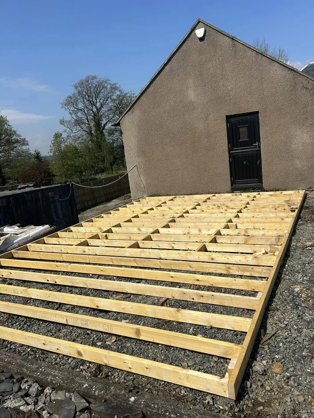Timber decking framework under construction, before deck boards are fitted